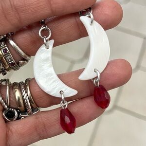 Handmade mother of pearl crescent moon earrings with dangly dark red drop beads